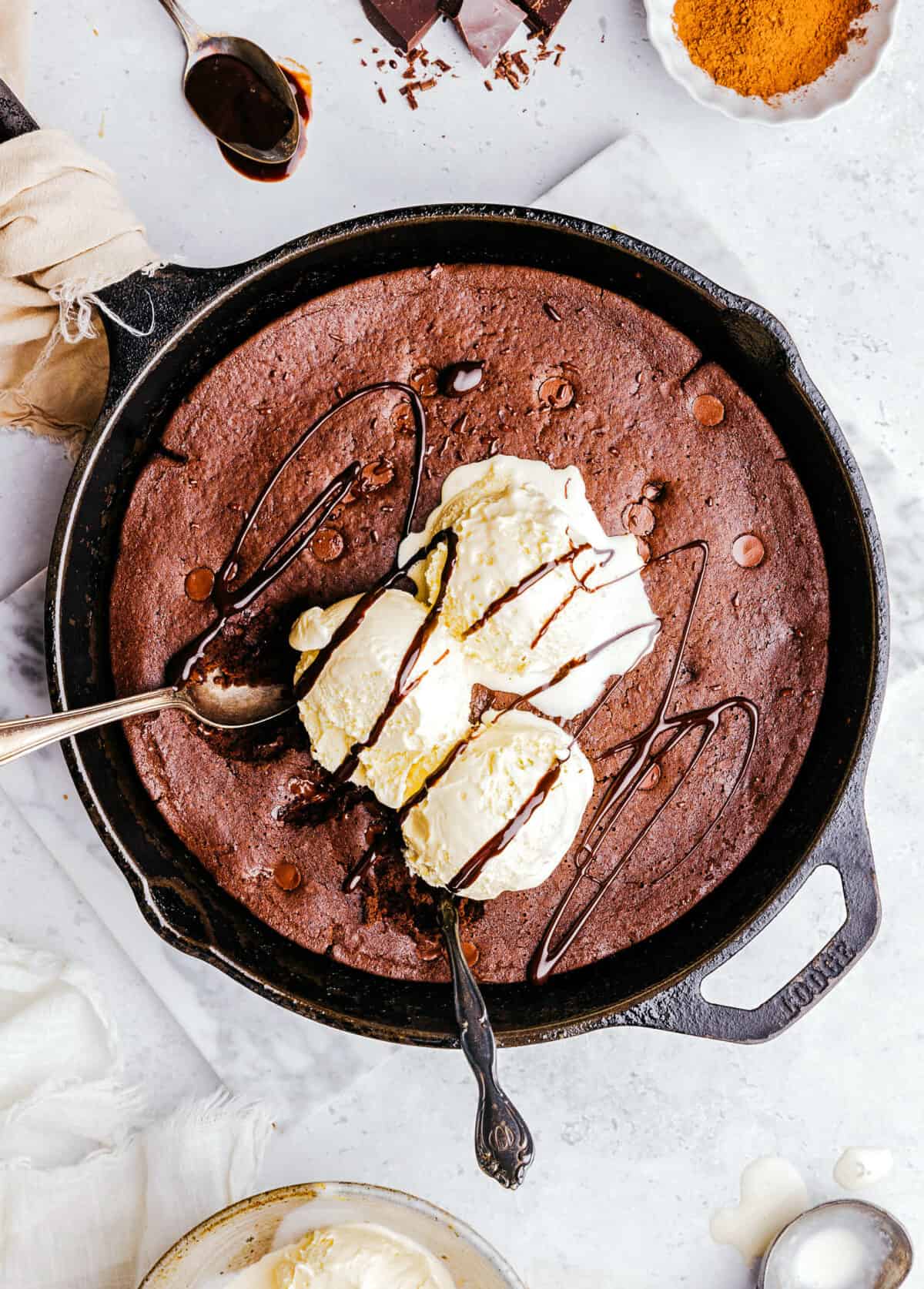 The absolute BEST Flourless Chocolate Chip Brownies that are fudgy, moist and delicious!  Made healthier with zero refined sugar, protein-packed black beans, and Greek yogurt!