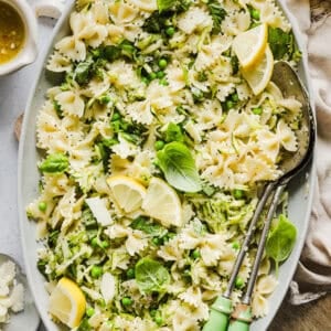 Add this light and zesty Lemon Basil Pasta Salad to your summer menu! This pasta salad is refreshing, flavorful and packed with fresh veggies. The perfect side dish to bring to your next cookout or picnic and makes a healthy weeknight dinner!