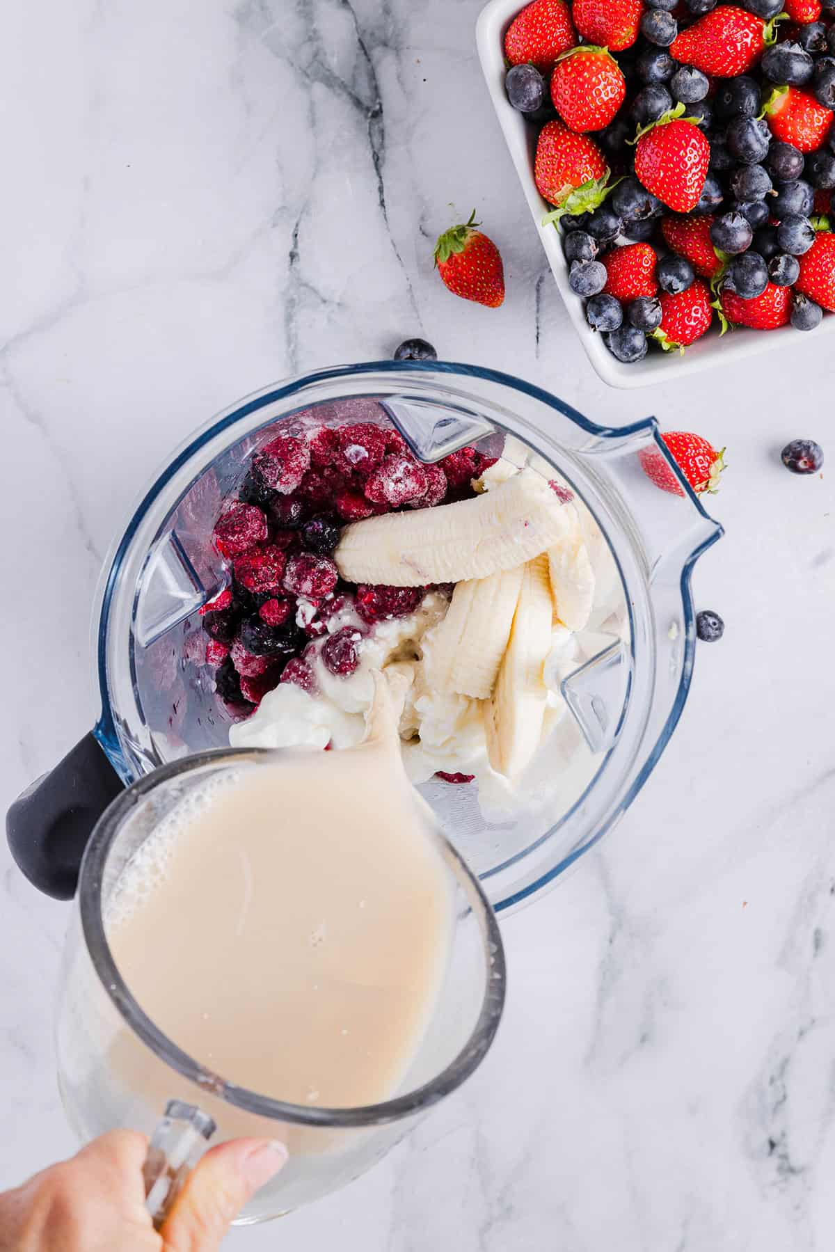 Start your morning with this perfect Mixed Berry Smoothie that is not only refreshing, but packed with antioxidants, fiber and vitamins!  So colorful and nutritious!