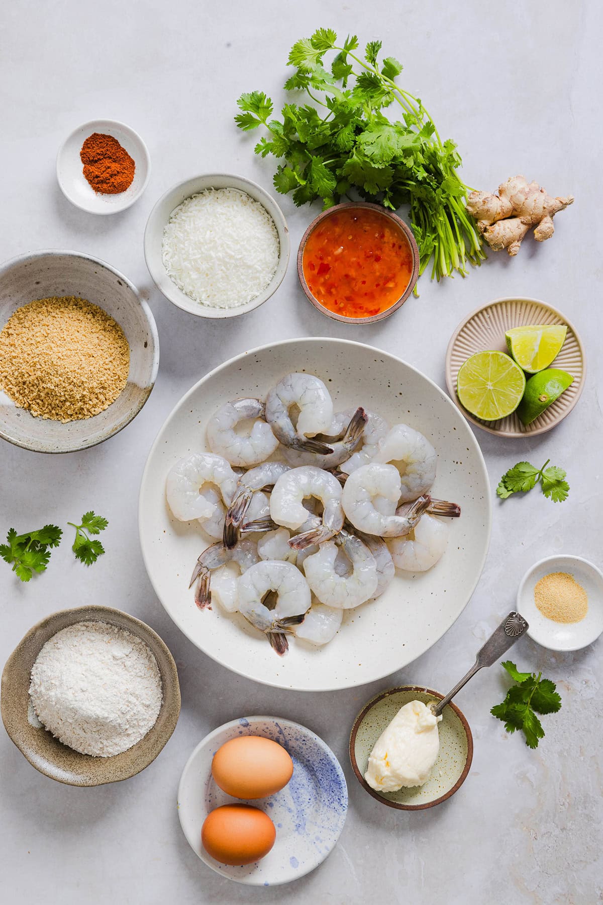 Sweet and Crispy Air Fryer Coconut Shrimp easily made in under 20 minutes and served with the most delicious chili dipping sauce! This appetizer is always a crowd-pleaser,  but also makes a filling main dish served with a salad, veggies or in a wrap.