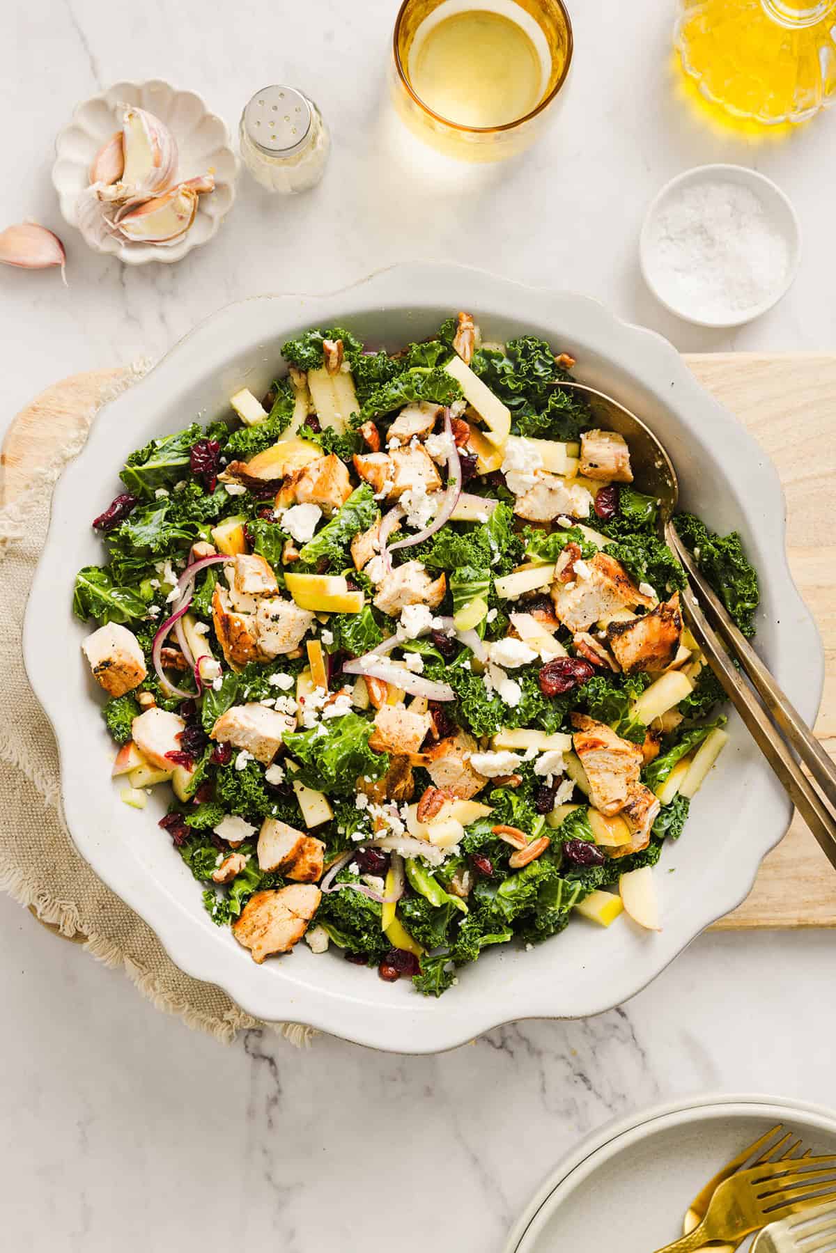 This fresh and flavorful Harvest Chopped Chicken Salad is made with leafy kale, tender juicy chicken, chopped apples and crunchy pecans all tossed with a maple dijon dressing! This salad is hearty enough for dinner and light enough for lunch!
