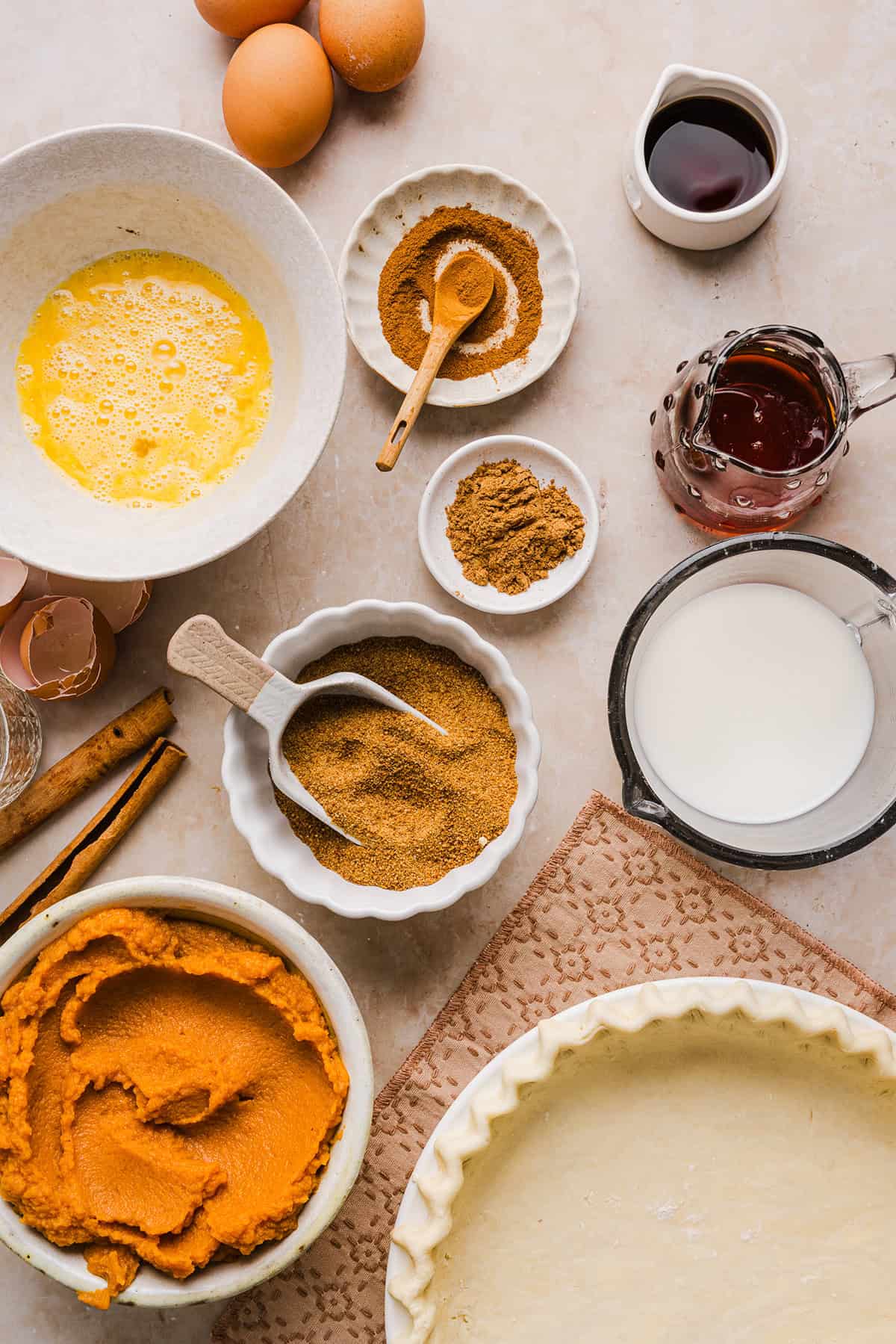 This creamy and delicious Healthy Pumpkin Pie makes the perfect holiday dessert! So easy to make, naturally sweetened with maple syrup and tastes great topped with whipped cream or vanilla ice cream!