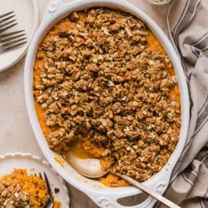 This Healthy Sweet Potato Casserole is a family favorite! A classic holiday side dish that tastes just as delicious as traditional sweet potatoes, but without any refined sugar and a wholesome pecan streusel topping!