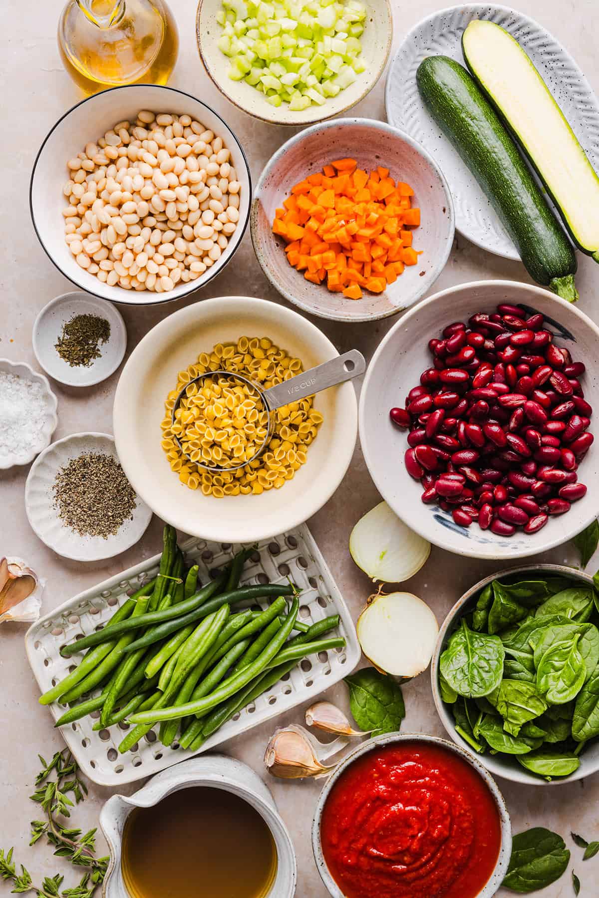 Easy and delicious Olive Garden Minestrone Soup loaded with fresh veggies, leafy greens and simmered in the most flavorful broth! Easily made in one pot for a cozy weeknight dinner the whole family will love!