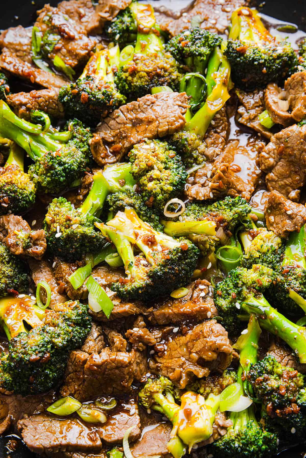 You'll love this Healthy Beef and Broccoli recipe made with tender flank steak, crisp broccoli and a savory garlic ginger sauce.  A quick and easy weeknight dinner that tastes better than take-out and comes together in under 30 minutes!