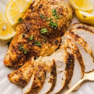Juicy Air Fryer Chicken Breast recipe that comes out perfectly every time in just 20 minutes! Seasoned with a blend of herbs and spices for a delicious, healthy meal great for busy weeknights or when you need to meal prep.