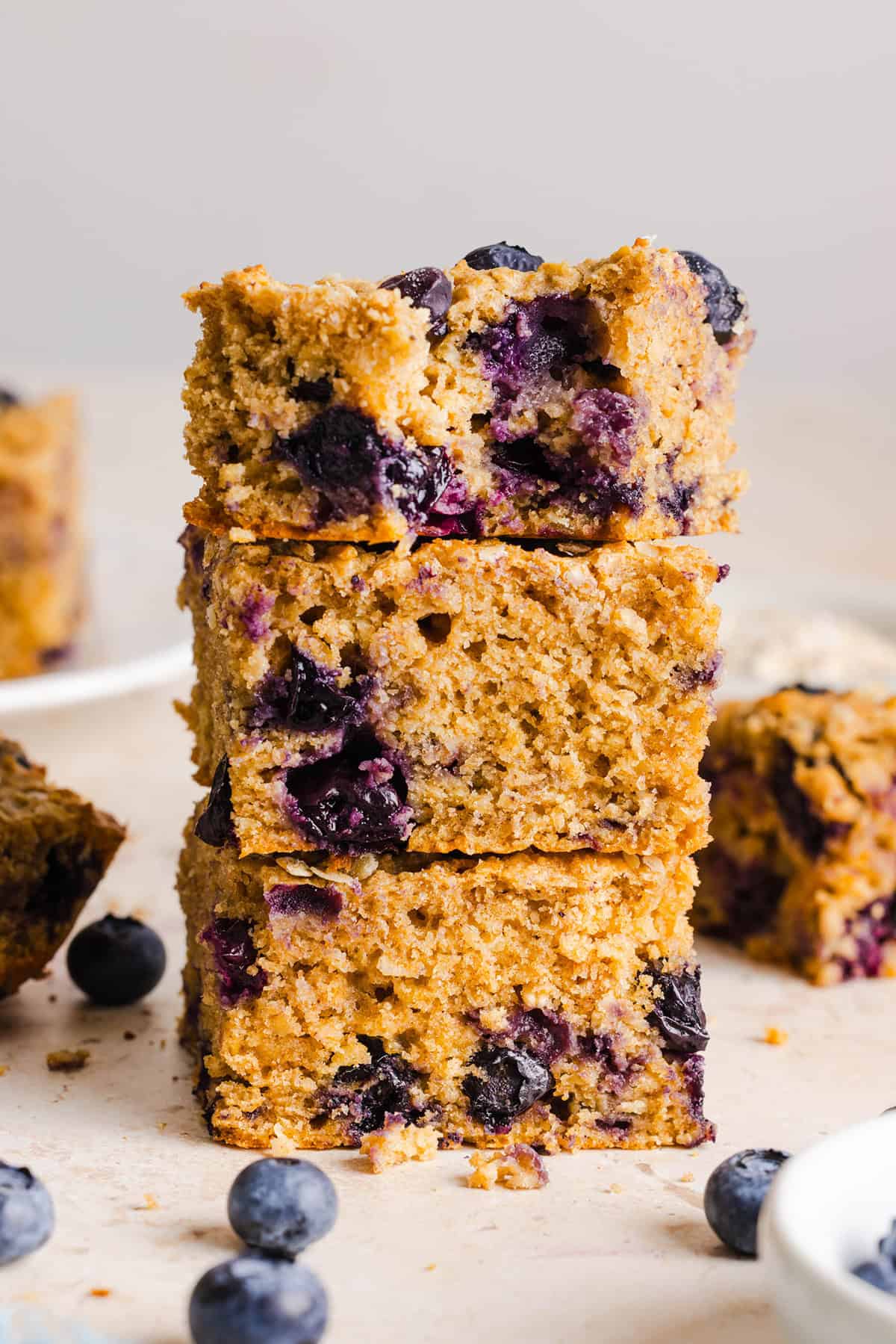 These Healthy Blueberry Oatmeal Breakfast Bars are easily made with wholesome oats, Greek yogurt, and fresh blueberries for the perfect morning breakfast or meal prep snack!