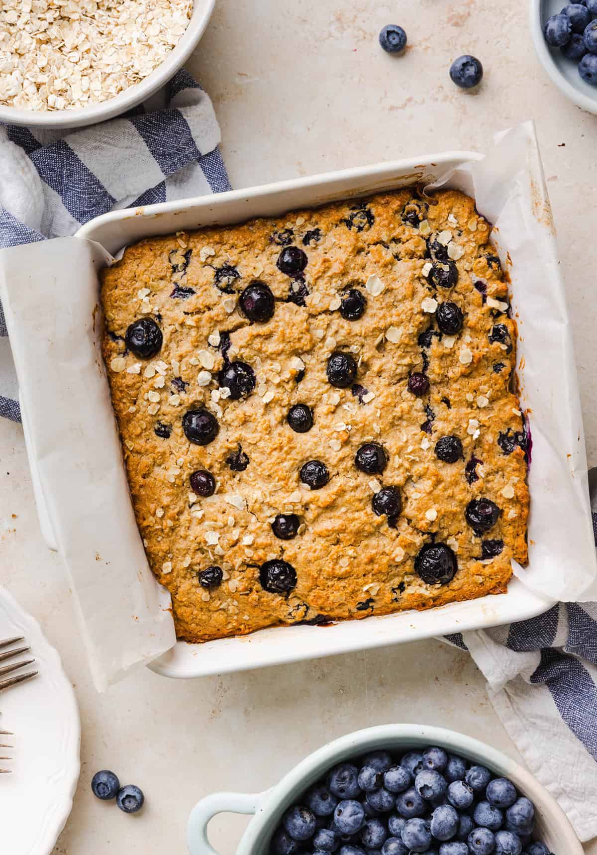 These Healthy Blueberry Oatmeal Breakfast Bars are easily made with wholesome oats, Greek yogurt, and fresh blueberries for the perfect morning breakfast or meal prep snack!