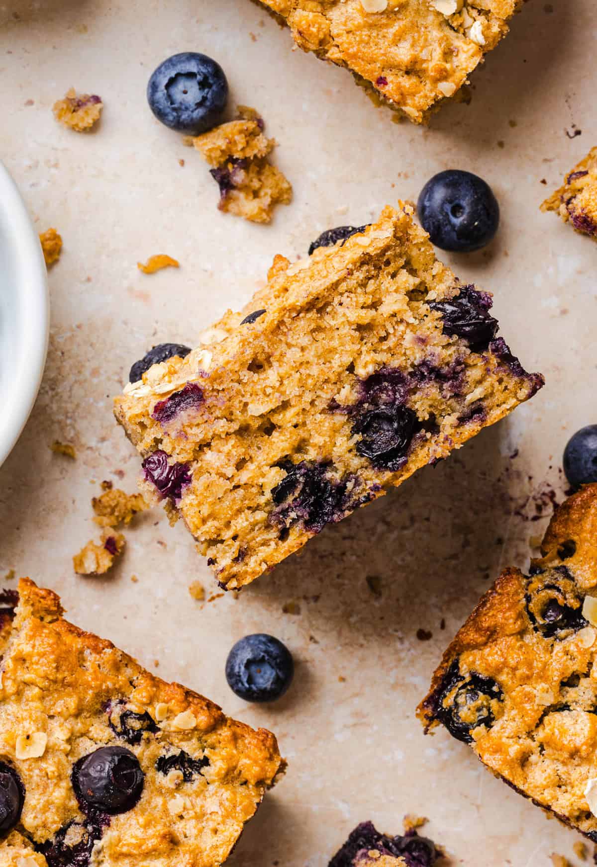 These Healthy Blueberry Oatmeal Breakfast Bars are easily made with wholesome oats, Greek yogurt, and fresh blueberries for the perfect morning breakfast or meal prep snack!