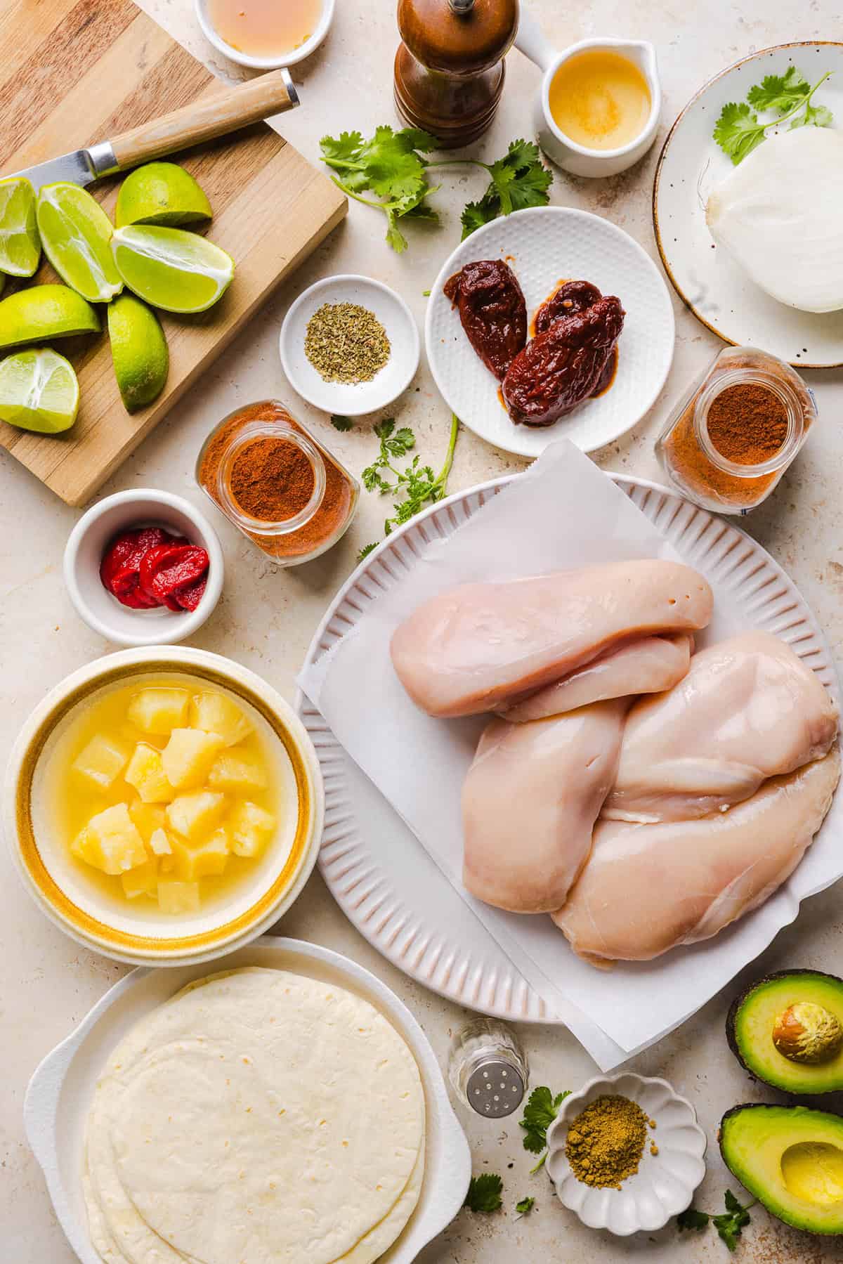 These Crock Pot Chicken Al Pastor Tacos are sweet, smoky, and incredibly flavorful! An easy slow cooker dinner made with juicy shredded chicken, fresh pineapple, chipotle peppers, and warm spices for a healthy, protein-packed dinner.