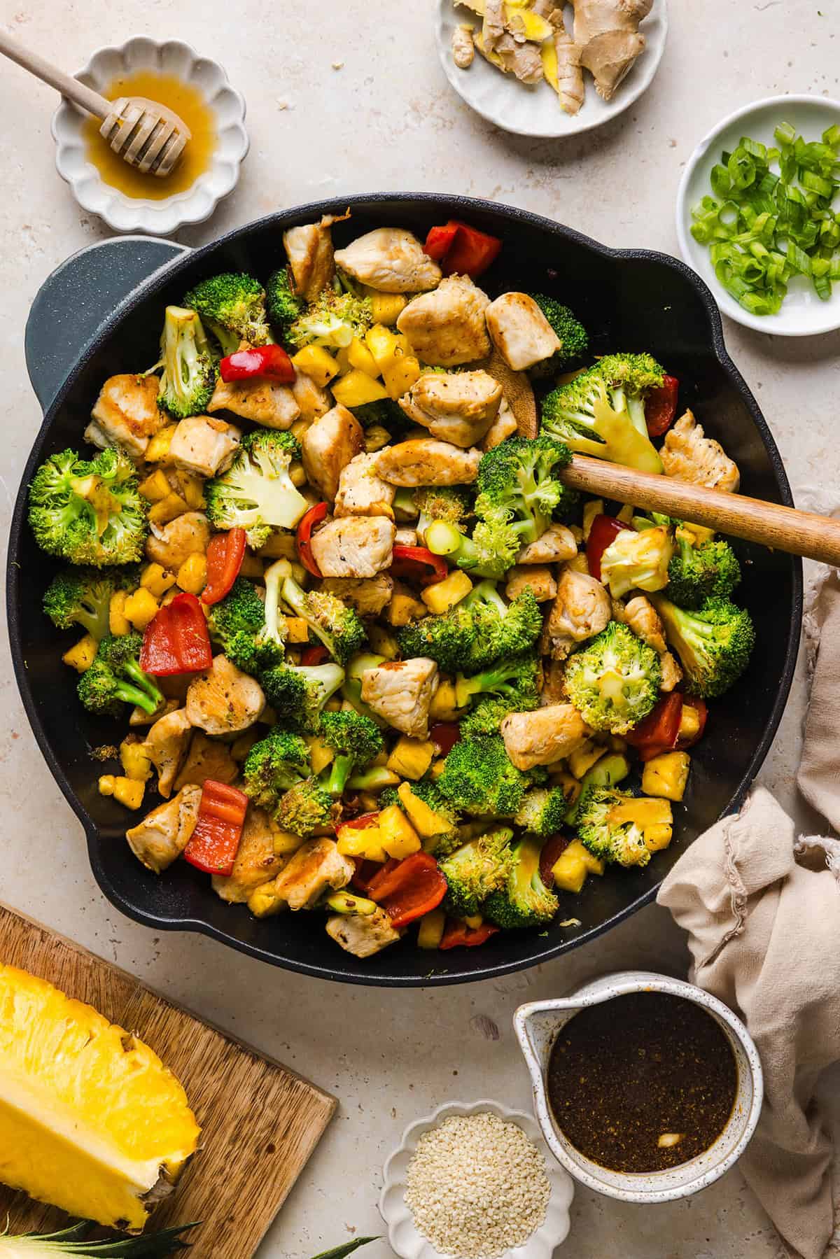 Skip the takeout with this Easy Pineapple Teriyaki Chicken Stir Fry! Made with juicy chicken, fresh pineapple, crisp veggies, and a healthy homemade teriyaki sauce in just 30 minutes.