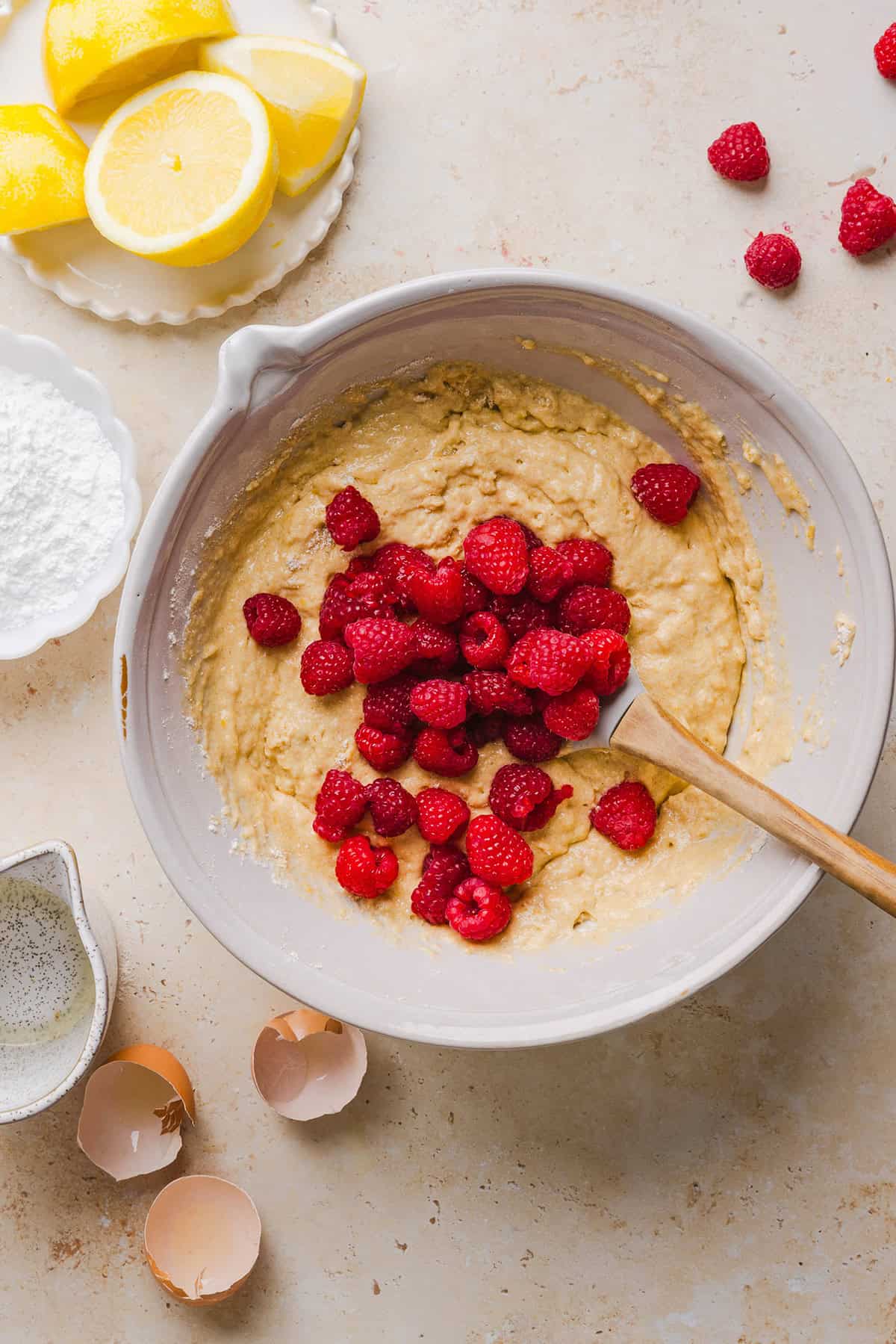 Make the BEST Raspberry Lemon Yogurt Bread with fresh raspberries, protein-packed Greek yogurt, and bright lemon flavor. This moist, wholesome quick bread is perfect for breakfast, brunch or dessert!
