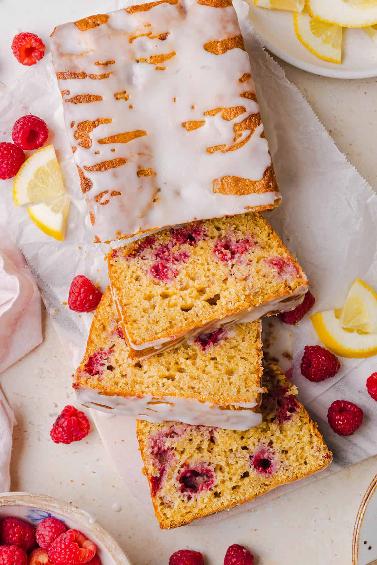 Make the BEST Raspberry Lemon Yogurt Bread with fresh raspberries, protein-packed Greek yogurt, and bright lemon flavor. This moist, wholesome quick bread is perfect for breakfast, brunch or dessert!