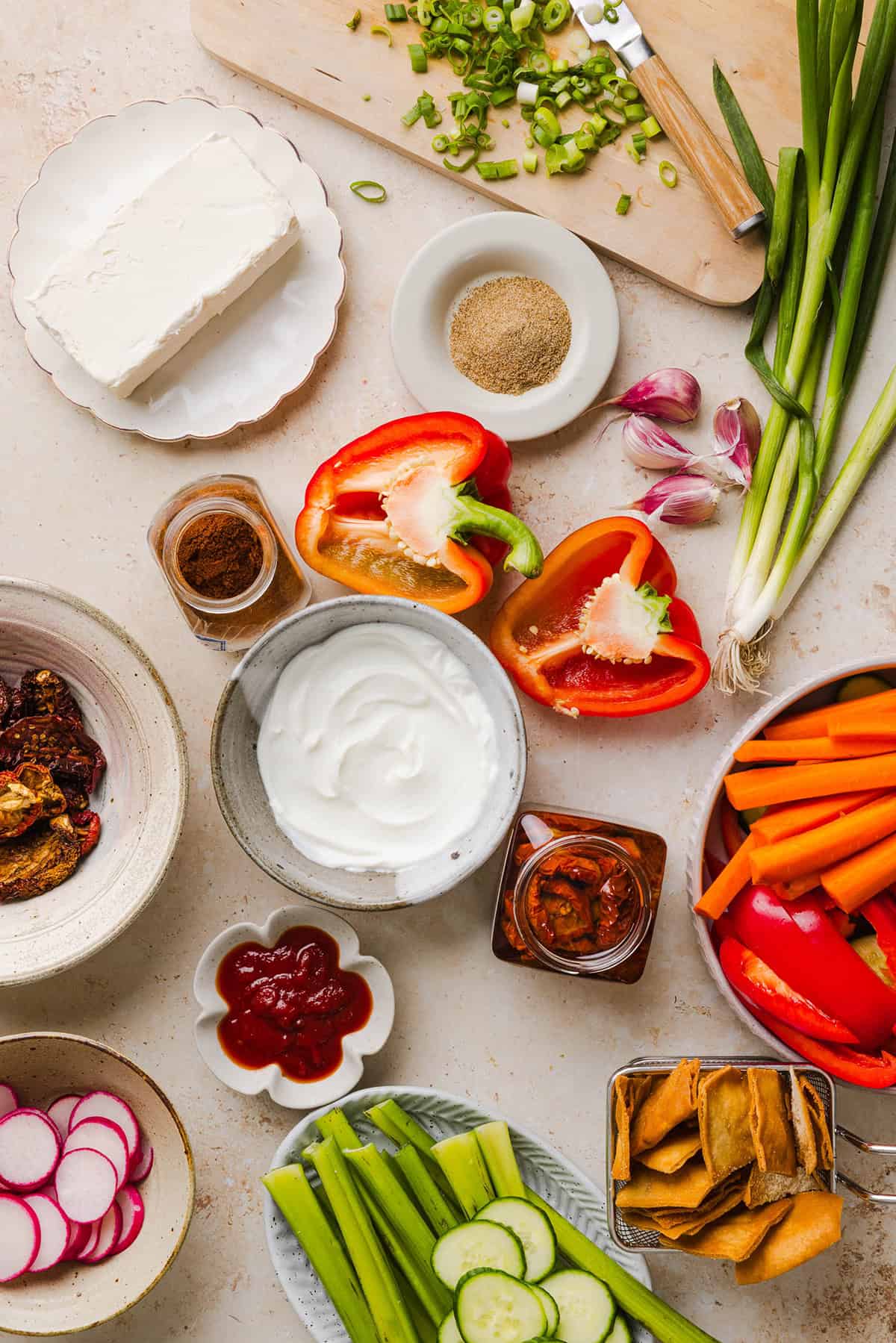 The BEST Creamy Sun-Dried Tomato Dip recipe made with protein-packed Greek yogurt, cream cheese, garlic, and bell peppers. Easy to make, perfect for parties, and ready in just minutes!
