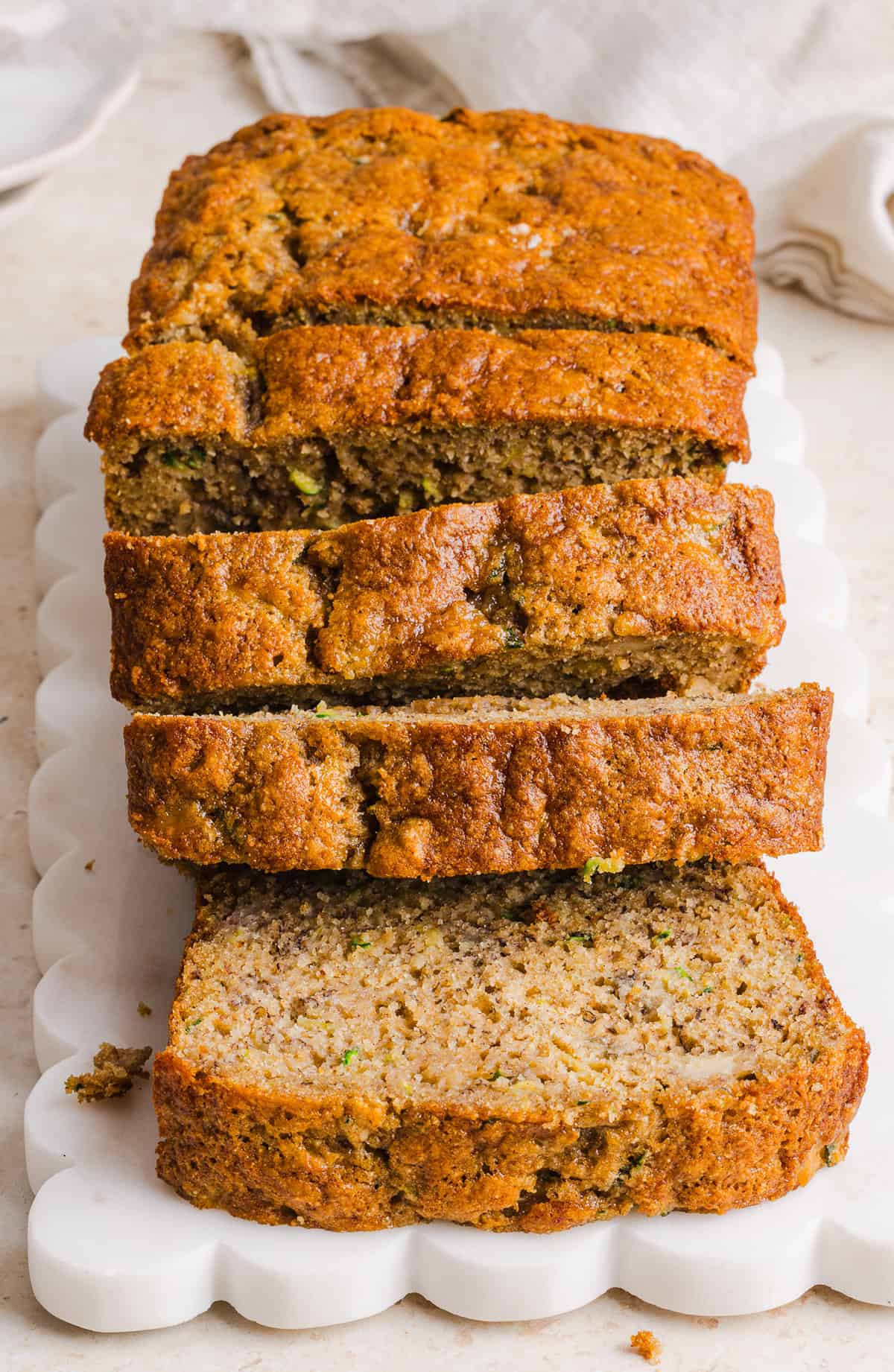 This Healthy Zucchini Banana Bread is soft, moist and perfectly sweet, made with ripe bananas, fresh zucchini and wholesome ingredients. Enjoy as an easy breakfast or nutritious snack!